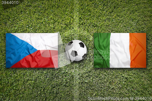 Image of Czech Republic vs. Ireland flags on soccer field