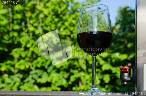 Image of A glass of red Bag-in-Box wine