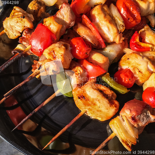 Image of Skewers with grilled meat and vegetables