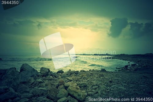 Image of Gloomy rocky coast and stormy sea