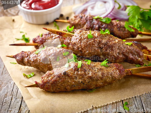 Image of grilled minced meat skewers