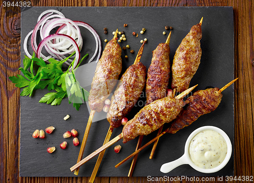 Image of grilled minced meat skewers kebabs