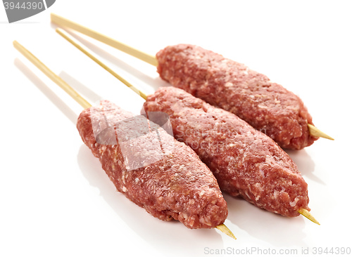 Image of fresh raw minced meat skewers kebabs