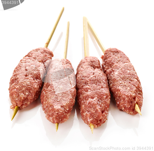 Image of fresh raw minced meat skewers kebabs