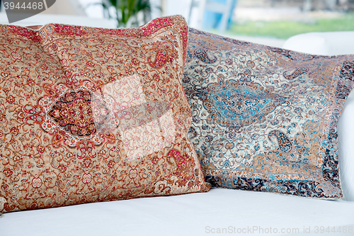 Image of pillows with a Arabic pattern