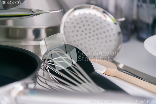 Image of Various tableware on shelf in the kitchen