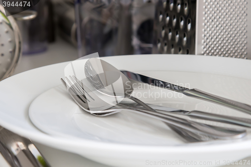 Image of Fork, Spoon and Table Knife on the white background