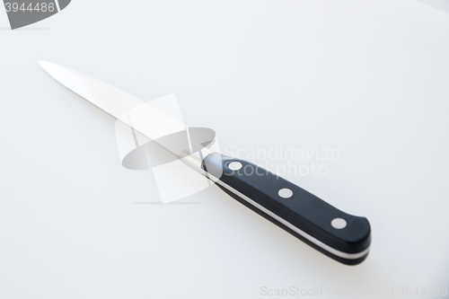 Image of Cutting board and kitchen knife
