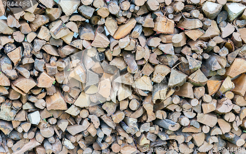 Image of dry chopped firewood logs in a pile