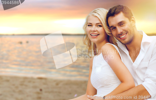 Image of couple having fun on the beach