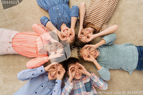 Image of happy children making faces and having fun