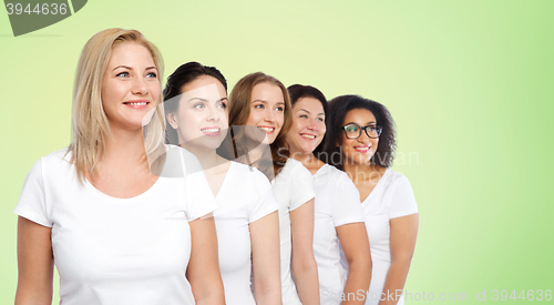 Image of group of happy different women in white t-shirts