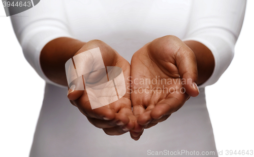 Image of female empty cupped hands showing something