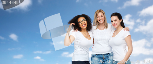 Image of group of happy different women in white t-shirts