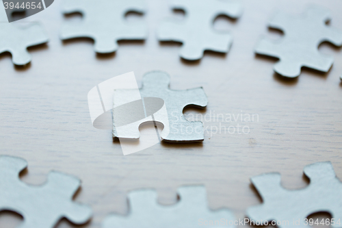 Image of close up of puzzle pieces on table