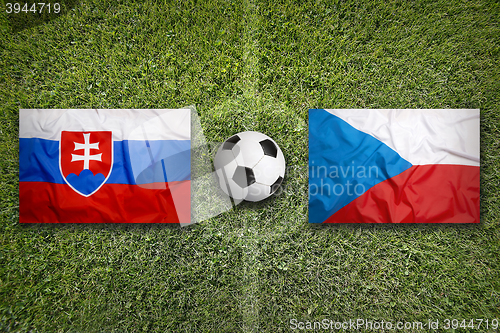 Image of Slovakia vs. Czech Republic flags on soccer field