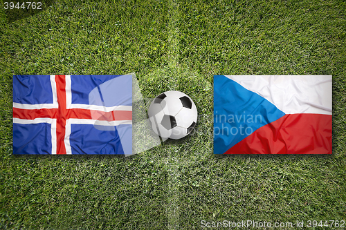 Image of Iceland vs. Czech Republic flags on soccer field