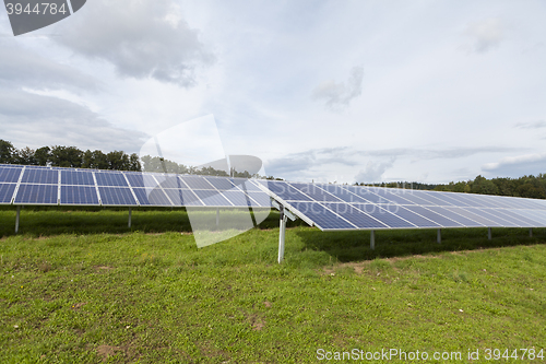 Image of Field with blue siliciom solar cells alternative energy