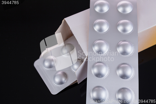 Image of Silver blister pack of small pills