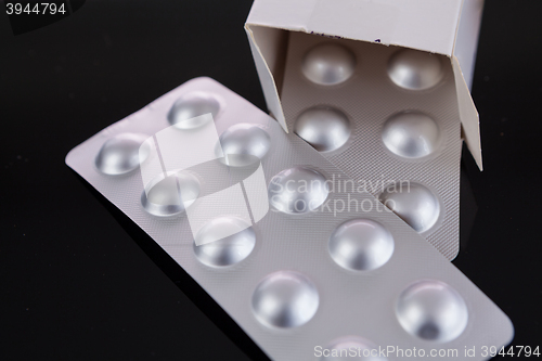 Image of Silver blister pack of small pills