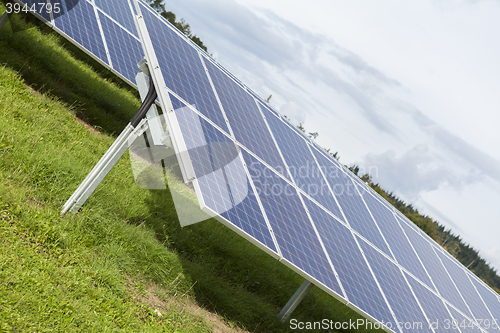 Image of Field with blue siliciom solar cells alternative energy