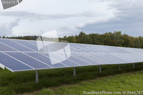 Image of Field with blue siliciom solar cells alternative energy