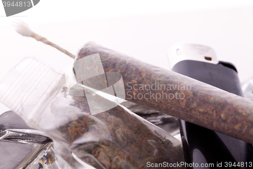 Image of Close up of marijuana and smoking paraphernalia