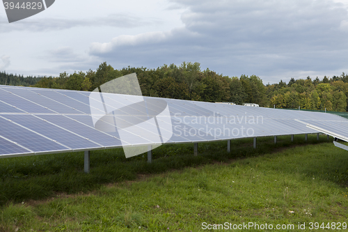 Image of Field with blue siliciom solar cells alternative energy