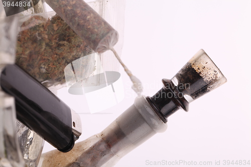 Image of Close up of marijuana and smoking paraphernalia