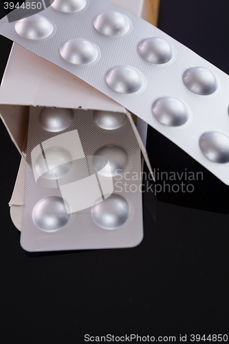 Image of Silver blister pack of small pills