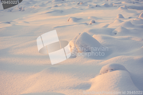 Image of landscape. weather, snowdrifts in the foreground