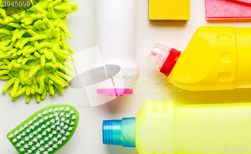 Image of House cleaning products on white table