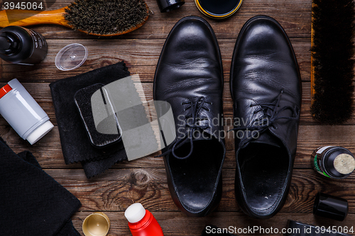 Image of Shoe wax, brush and boot