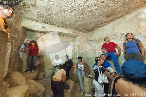Image of Tourists visit hall inside pyramid of Giza. Egypt