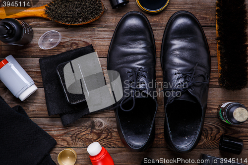 Image of Shoe wax, brush and boot