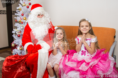 Image of The girls are asking for frost grandfather to give them gifts