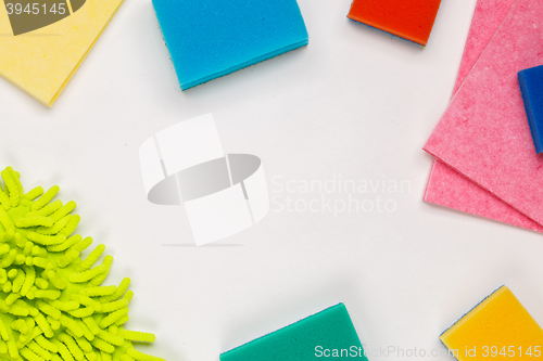 Image of House cleaning products on white table