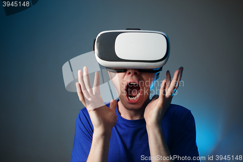 Image of Man using VR glasses