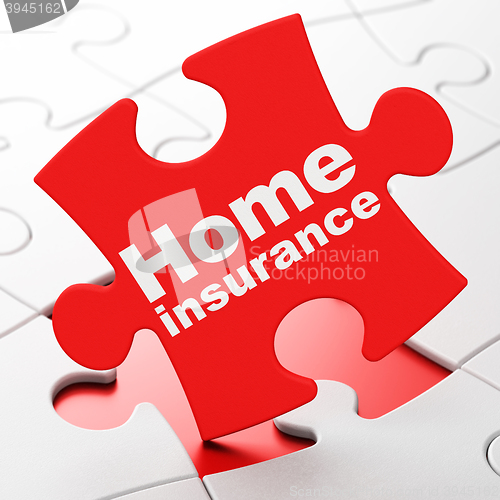 Image of Insurance concept: Home Insurance on puzzle background