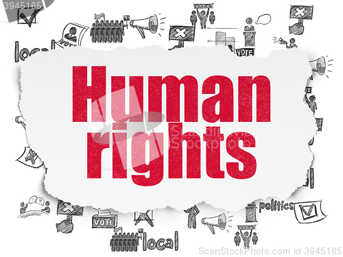 Image of Politics concept: Human Rights on Torn Paper background