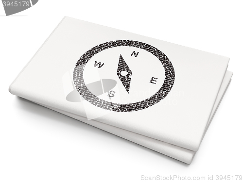 Image of Travel concept: Compass on Blank Newspaper background