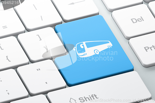 Image of Tourism concept: Bus on computer keyboard background