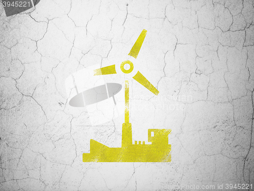 Image of Manufacuring concept: Windmill on wall background