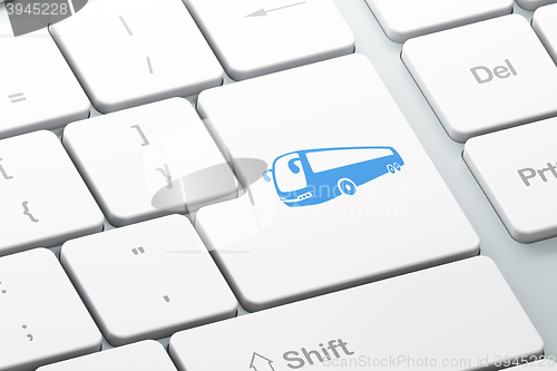 Image of Travel concept: Bus on computer keyboard background