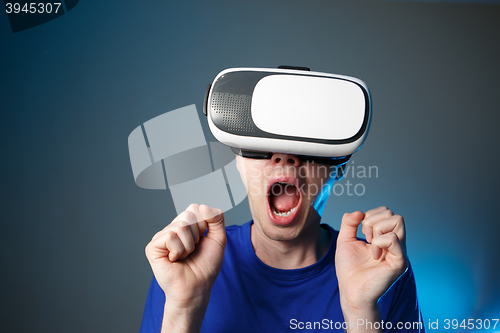 Image of Man using VR glasses