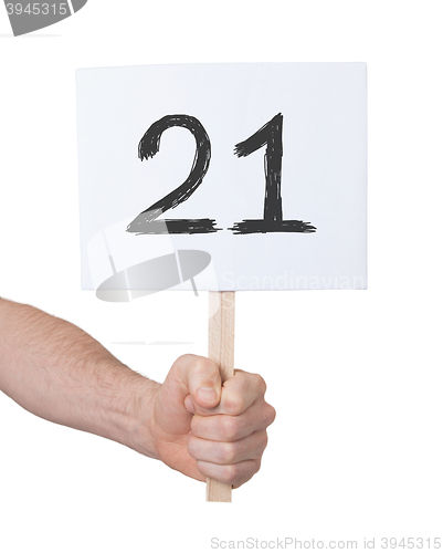 Image of Sign with a number, 21
