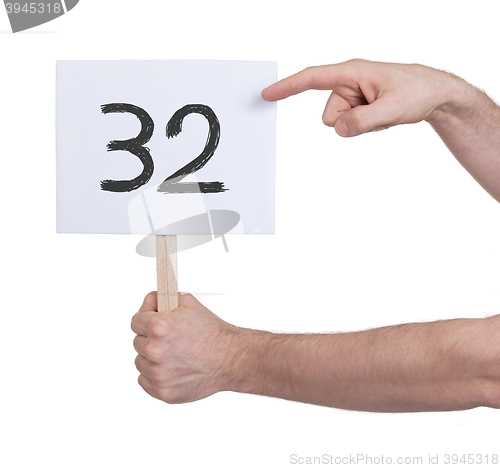 Image of Sign with a number, 32