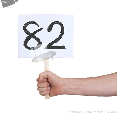 Image of Sign with a number, 82