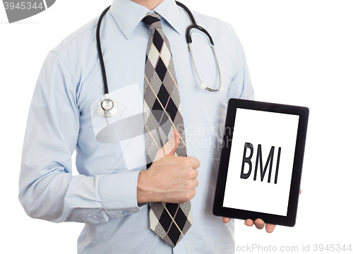 Image of Doctor holding tablet - BMI