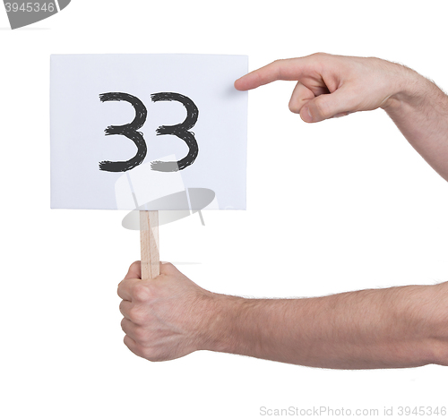 Image of Sign with a number, 33